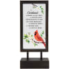 Framed sign with a cardinal illustration and floral accents on a stand