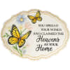 Decorative plaque with butterflies, flowers, and memorial text