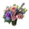 Roses, spray roses, gerbera daisy, kale, blue thistle, wax flower and fall
