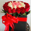 Luxury rose arrangement featuring premium red, white and pink roses elegantly designed