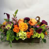 Bring the rich beauty of autumn indoors with this stunning fall floral