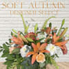 A stunning seasonal combo of soft autumnal colors of flowers in a
