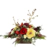 Holiday floral arrangement with red and yellow blooms in a wooden container