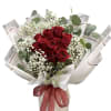 Bouquet of red roses with white baby's breath and eucalyptus in white wrap