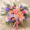 Inspired by Eos, the Greek goddess of the dawn, this bouquet captures