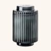 Black ribbed glass jar with a lid on a plain background