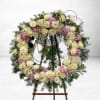 Elegant and timeless, the Lavender Embrace Wreath is a stunning tribute crafted