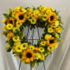 18" OPEN HEART, FILLED WITH SUNFLOWERS, YELLOW DAISIES, YELLOW ROSES, FILLER AND