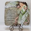 Decorative memorial plaque with a sleeping angel and sympathy message