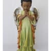 Praying angel figurine in a green robe with white wings