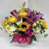 Bright, joyful sunflowers take center stage in this birthday bouquet and celebratory