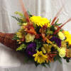 Horn of plenty with lots of cheerful fall colored flowers. Great for