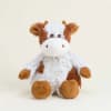 Plush cow stuffed animal with brown, white, and tan fur