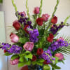 Incredible red and purple arrangement for anniversary, valentines or any other occasion.