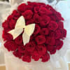 Bouquet of red roses with a white ribbon bow