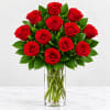 Bouquet of red roses in a clear glass vase