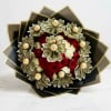 Bouquet of red and white roses wrapped with folded dollar bills