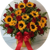 Sunflowers and red roses in a yellow box with a red ribbon