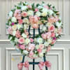 Beautiful blooms in pastel tones of pinks and white. Comes displayed on