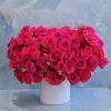 This arrangement is a vibrant expression of romance and modern luxury. An