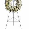 Fragrant and ethereal white blossoms set among a ring of soothing greens