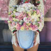 Roses, Baby Roses, Orchids, Lisianthus, Tulips, and some Decorative Flowers.