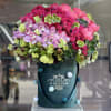 Hot pinks in our dark green velvet medium box