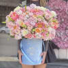 Handcrafted with fabric and care, each flower is selected to capture the