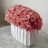 50 gorgeous geraldine roses in our vintage white vase. The honey smell