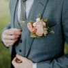 A twist on a classic! This boutonniere is custom made to slip
