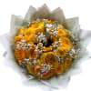 Bouquet of yellow roses with white baby's breath wrapped in pale paper