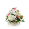 Pink roses and white daisies in a wicker basket