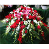 Large red and white floral spray with pink lilies