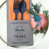 Thank-you gift set with a card, plastic cutlery, and a paper favor box