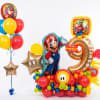 Mario-themed balloon display with colorful balloons and foil character balloons