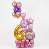 Pink, purple, and gold balloon arrangement with birthday balloons and a large number 6