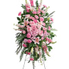 Tall pink and white floral standing spray on an easel