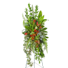 Tall tropical floral standing spray with red-orange blooms and mixed greenery