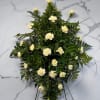 This simple standing spray is perfect for a funeral service. This includes