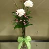 3 carnations in a bud vase. Color will vary