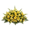 Yellow floral centerpiece with roses, lilies, and daisies