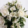White roses and alstroemeria arranged in a bouquet
