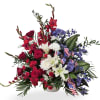 Freedom's Tribute is a striking red, white, and blue podium arrangement designed