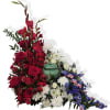 Freedom's Tribute Cremation Adornment is a red, white and blue arrangement designed