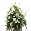 Tall white and green floral arrangement in a pedestal vase