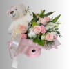 Pink rose bouquet with a teddy bear in a pink hat and box