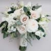 Delicate, romantic, and timeless &mdash; the Blush Ivory Elegance Bridal Bouquet is