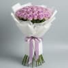 Bouquet of lavender roses wrapped in white paper with a purple ribbon