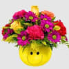 Roses, mums, carnations, alstro, all in bright colors and in a keepsake