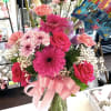 First bouquet with small balloon, roses, Gerber daisies, Gladiolas, mix flowers in